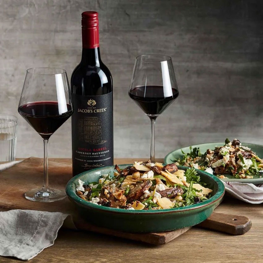 GRILLED MUSHROOM WITH CRUMBLED GOATS CHEESE AND SHAVED PARMESAN